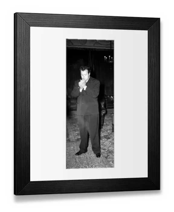 Framed Print : Orson Welles American Actor Film Producer - in London Hotel - smoking a cigar
