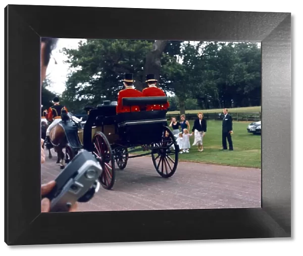 Duchess of York with her family as the Queens carriage sweeps past