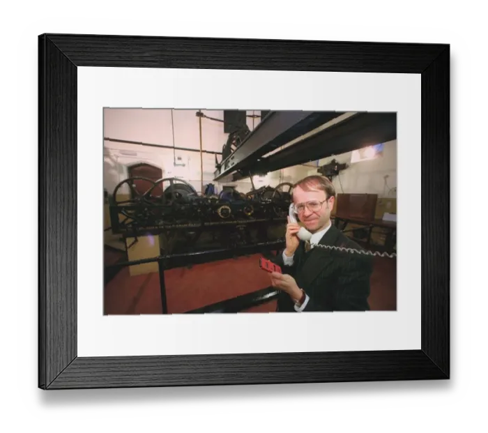 Framed Print : Mike McCann Keeper of the Great Clock December 1999 checks the time - by telephone Framed Print : Mike McCann Keeper of the Great Clock December 1999 checks the time - by telephone