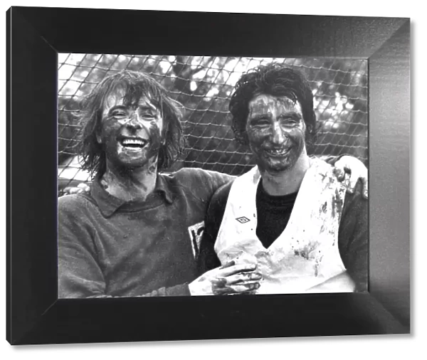 Queens Park Rangers stars Stan Bowles (left) and Dave Clement enjoying a mud-lark