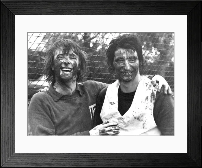 Framed Print : Queens Park Rangers stars Stan Bowles (left) and Dave Clement enjoying a mud-lark Framed Print : Queens Park Rangers stars Stan Bowles (left) and Dave Clement enjoying a mud-lark