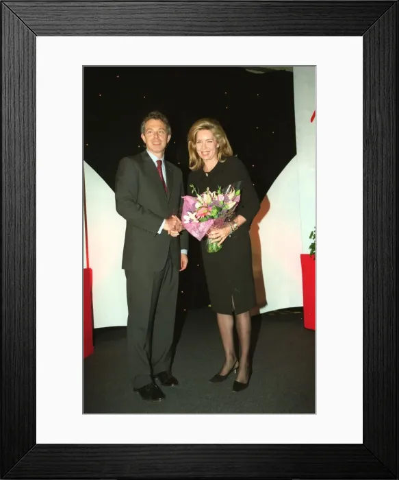 Framed Print : Tony Blair MP with Queen Noor of Jordan and bouqet May 1999 at The Mirror Pride of