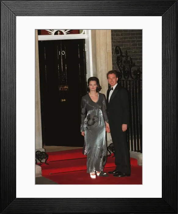 Framed Print : Tony Blair and his wife Cherie Blair outside number Ten Downing Street on their way to Framed Print : Tony Blair and his wife Cherie Blair outside number Ten Downing Street on their way to