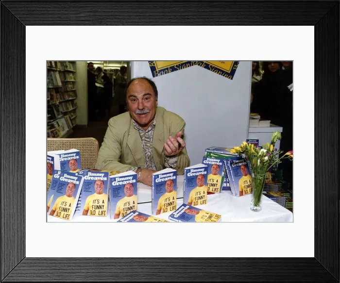 Framed Print : Jimmy Greaves former England footballer signs copies of his book It Framed Print : Jimmy Greaves former England footballer signs copies of his book It