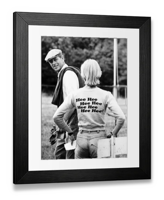Framed Print : Prince Philip meets a girl wearing a funny tee-shirt
