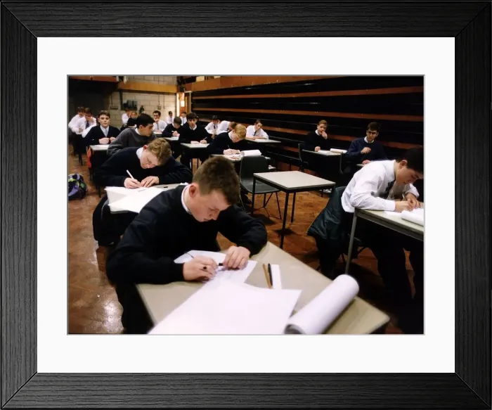 Framed Print : Huyton Comprehensive School, were children are taking their examinations in the main hall Framed Print : Huyton Comprehensive School, were children are taking their examinations in the main hall