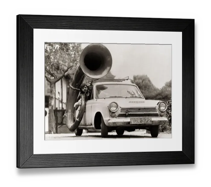 Framed Print : A man driving car with a large Sousaphone attached to the side Musical instruments Framed Print : A man driving car with a large Sousaphone attached to the side Musical instruments