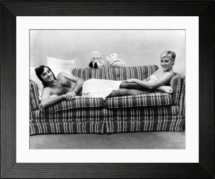 Framed Print : George and Angie curl up together in their love nest. September 1976 P003799 Framed Print : George and Angie curl up together in their love nest. September 1976 P003799