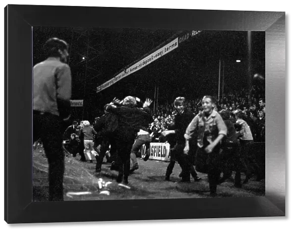 Fans run onto the pitch. Mansfield v. Liverpool. September 1970 71-00193-003