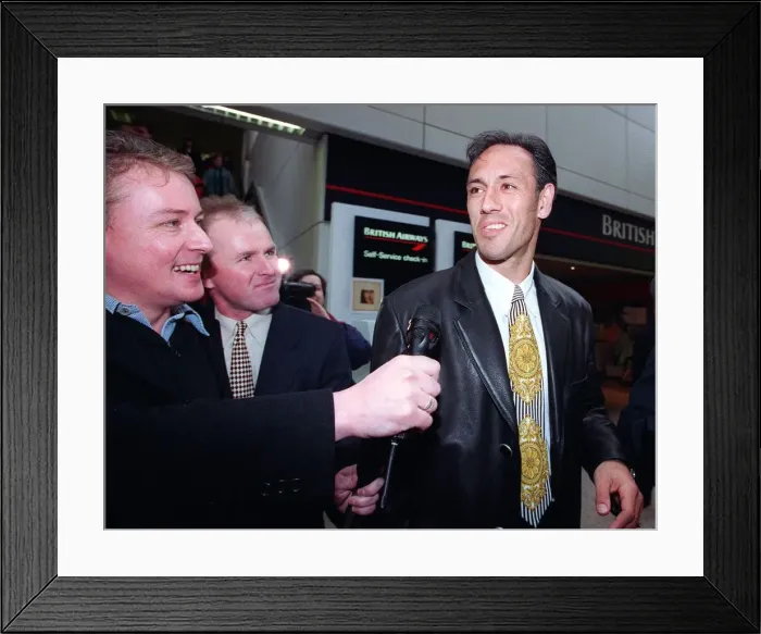 Framed Print : Mark Hateley arrives at Glasgow Airport to re-sign for Rangers Football Club speaking to Framed Print : Mark Hateley arrives at Glasgow Airport to re-sign for Rangers Football Club speaking to