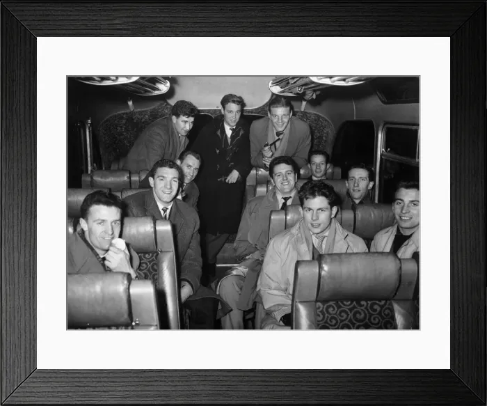 Framed Print : Bournemouth here we come! Manchester Utd. players after leaving Euston, London