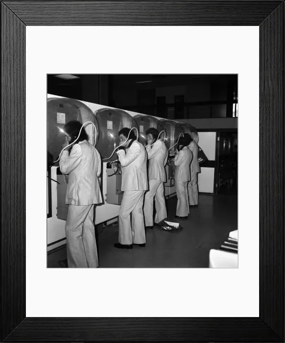Framed Print : England Football Team: Some members of the England Football Team phoning home before Framed Print : England Football Team: Some members of the England Football Team phoning home before
