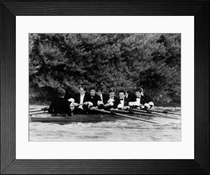 Framed Print : The crew from Oxford row down the thames in their boat dressed in dinner suits