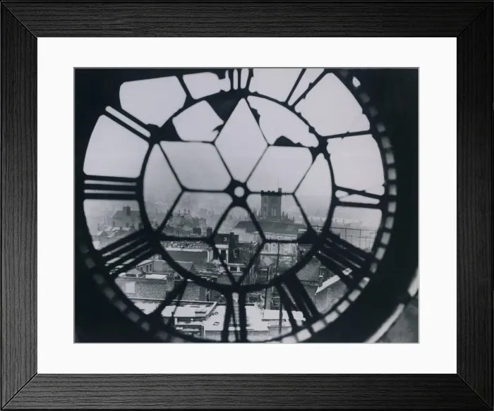 Framed Print : View through the bomb damaged clock on the market tower after the blitz in Coventry Framed Print : View through the bomb damaged clock on the market tower after the blitz in Coventry