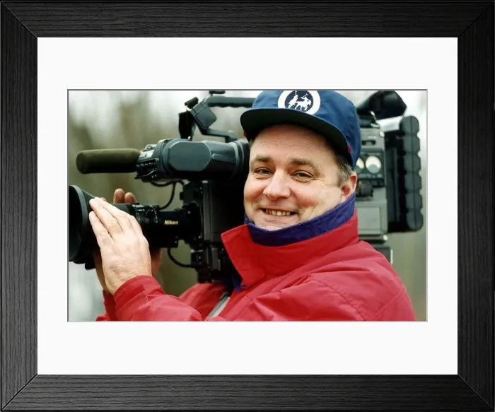 Framed Print : Mike Lloyd photographer holding video camera Framed Print : Mike Lloyd photographer holding video camera