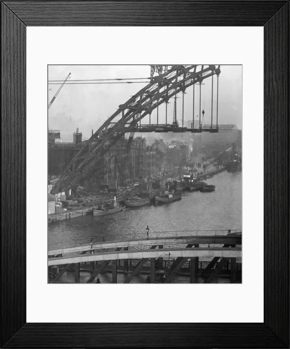 Framed Print : Fishing boats tied to the quay are frame by the Construction of Tyne Bridge in early 1928 Framed Print : Fishing boats tied to the quay are frame by the Construction of Tyne Bridge in early 1928