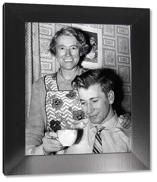 Bobby Charlton the Manchester United forward is seen with his mother Cissie afther his