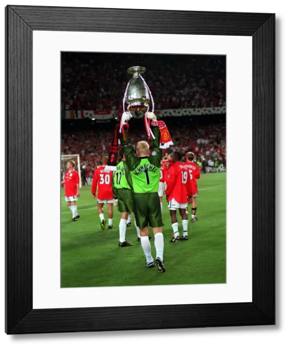 Framed Print : Manchester Uniteds Peter Schmeichel holds the European Cup as he salutes the crowd Framed Print : Manchester Uniteds Peter Schmeichel holds the European Cup as he salutes the crowd