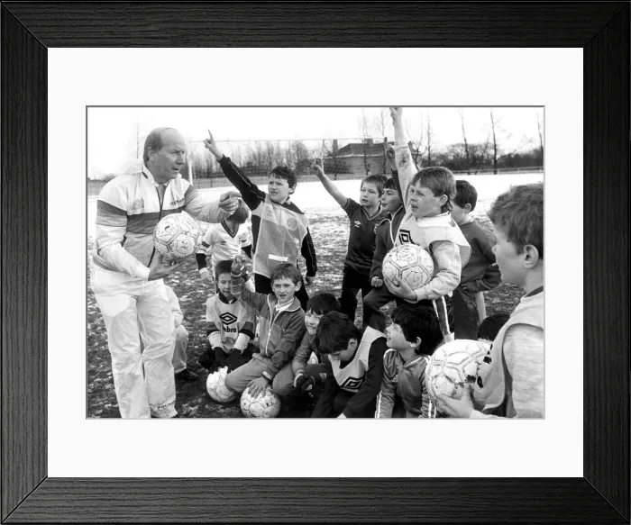 Framed Print : Soccer hero Bobby Charlton praised the enthusiasm of 50 youngsters eager to learn Framed Print : Soccer hero Bobby Charlton praised the enthusiasm of 50 youngsters eager to learn