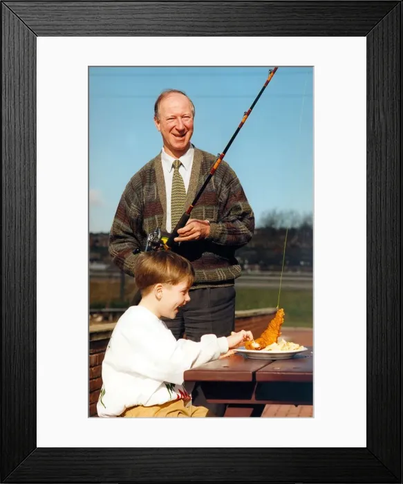 Framed Print : Seven year old Luke Holden joined forces with Jack Charlton at Harry Ramsdens to launch a Framed Print : Seven year old Luke Holden joined forces with Jack Charlton at Harry Ramsdens to launch a