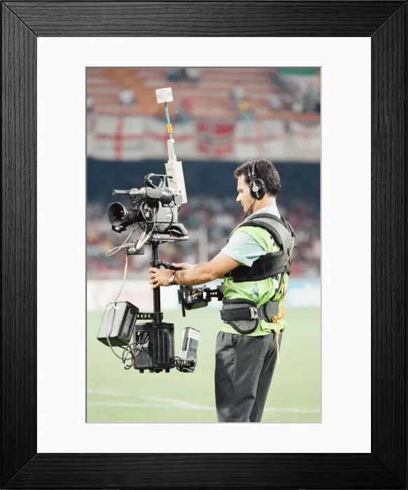 Framed Print : Cameraman using Steady Cam at England v Cameroon World Cup Quarter Final match Framed Print : Cameraman using Steady Cam at England v Cameroon World Cup Quarter Final match