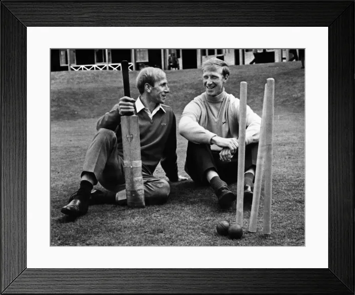 Framed Print : Bobby and Jack Charlton trying their hand at cricket at an England training session Framed Print : Bobby and Jack Charlton trying their hand at cricket at an England training session
