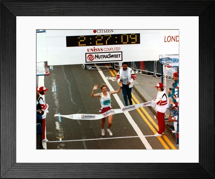 Framed Print : Katrin Dorre crosses the finish line of the 1993 London Marathon