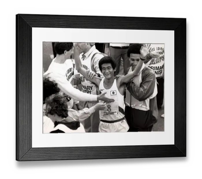 Framed Print : Hiromi Taniguchi holds his arms in the air to celebrate winning the 1987 London Marathon Framed Print : Hiromi Taniguchi holds his arms in the air to celebrate winning the 1987 London Marathon