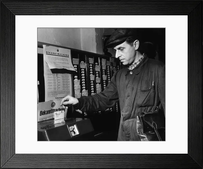 Framed Print : German Car Worker Heinrich Gemnich December 1953 clocks on at the Volkswagen car Framed Print : German Car Worker Heinrich Gemnich December 1953 clocks on at the Volkswagen car