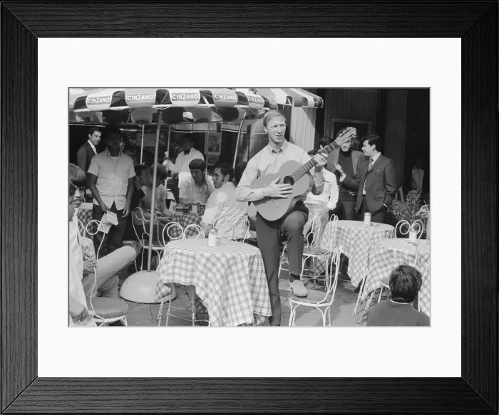 Framed Print : 1970 World Cup Finals in Mexico. England defender Jack Charlton strumming a guitar