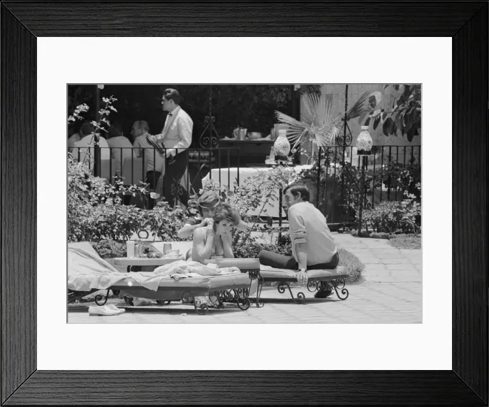Framed Print : 1970 World Cup Finals in Mexico. England players relaxing by the side of Framed Print : 1970 World Cup Finals in Mexico. England players relaxing by the side of
