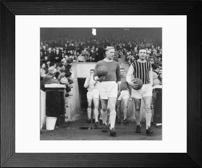 Framed Print : Bert Trautmann leads out the combined Manchester City and Manchester United team against Framed Print : Bert Trautmann leads out the combined Manchester City and Manchester United team against