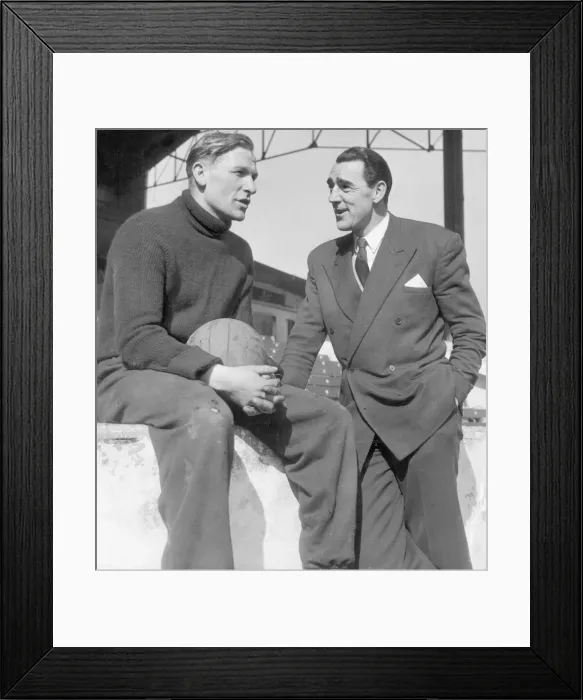 Framed Print : Frank Swift (Right) former Manchester Goalkeeper seen here talking with Bert Trautmann Framed Print : Frank Swift (Right) former Manchester Goalkeeper seen here talking with Bert Trautmann