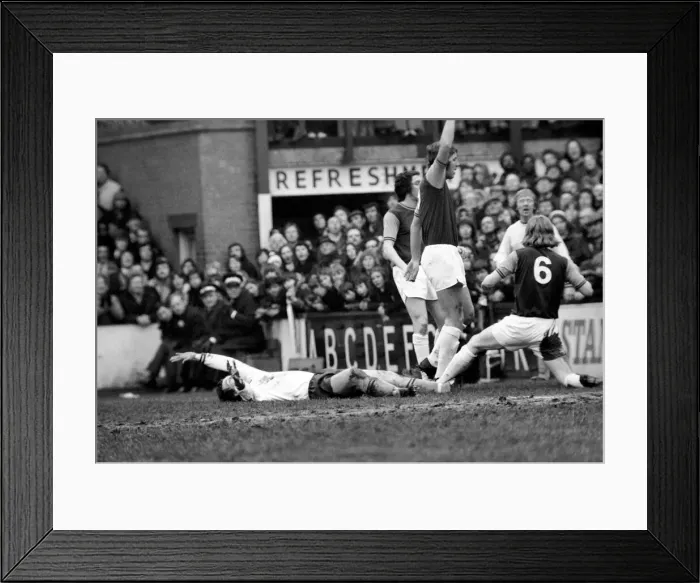 Framed Print : Football: West Ham F. C. v. Burnley. West Ham (2) v. Burnley (1). March 1975 75-01466-029 Framed Print : Football: West Ham F. C. v. Burnley. West Ham (2) v. Burnley (1). March 1975 75-01466-029