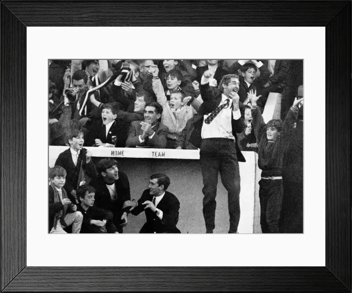 Framed Print : Ayr United manager Ally MacLeod jumps into the air outside the dug-out wearing a blazer Framed Print : Ayr United manager Ally MacLeod jumps into the air outside the dug-out wearing a blazer