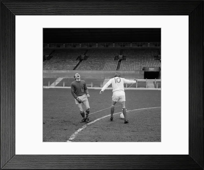 Framed Print : Manchester United players Nobby Stiles and Denis Law playing against each other during a Framed Print : Manchester United players Nobby Stiles and Denis Law playing against each other during a