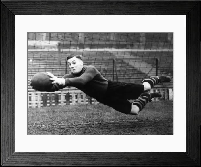 Framed Print : Manchester United goalkeeper Jack Crompton makes a flying save during a training session Framed Print : Manchester United goalkeeper Jack Crompton makes a flying save during a training session