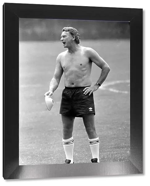 Bobby Robson - June 1986 England manager seen bare chested on the training
