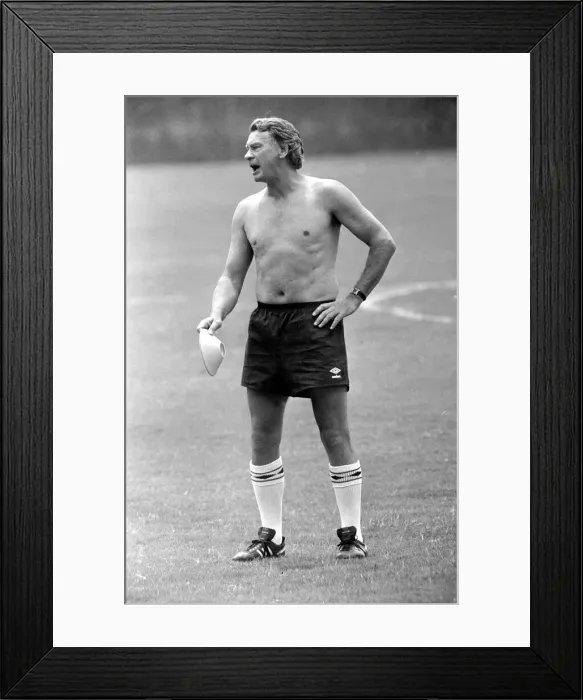 Framed Print : Bobby Robson - June 1986 England manager seen bare chested on the training