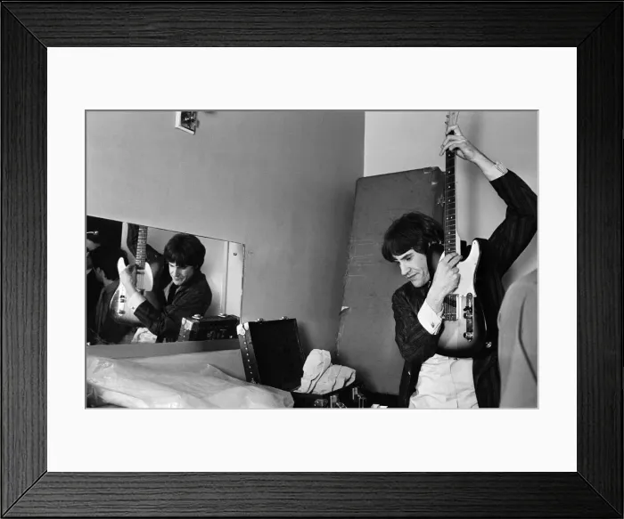 Framed Print : Ray Davies of The Kinks pop group rehearsing in their dressing room before a concert Framed Print : Ray Davies of The Kinks pop group rehearsing in their dressing room before a concert