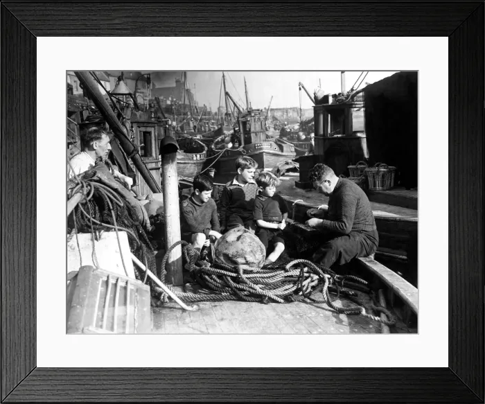 Framed Print : Pictures of the old salt telling the tale of the sea to children Framed Print : Pictures of the old salt telling the tale of the sea to children