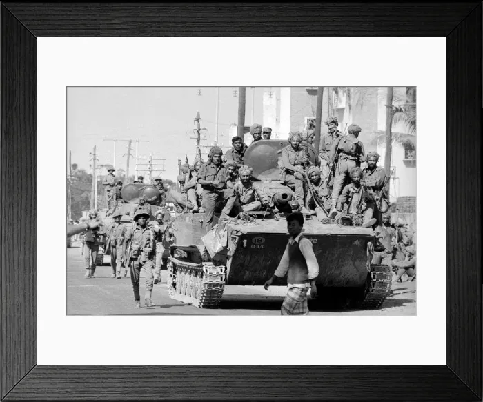 Framed Print : Elements of the victorious Indian army enter Kulna following the surrender of Framed Print : Elements of the victorious Indian army enter Kulna following the surrender of