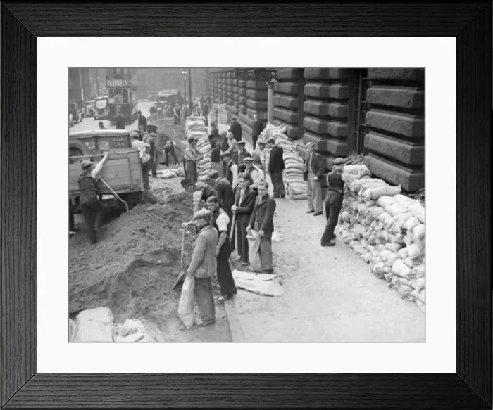  : Sandpacking, Filling sandbags in Birmingham city centre in the months