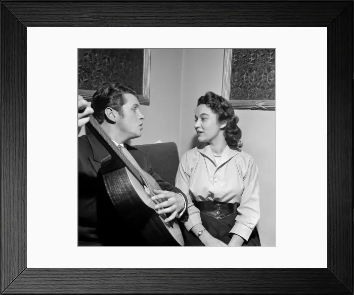 Framed Print : This courting couple break with tradition and exchange earrings to mark their engagement