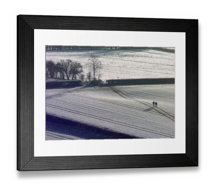Framed Print : Walkers brave sub zero temperatures for a stroll across the snow Framed Print : Walkers brave sub zero temperatures for a stroll across the snow