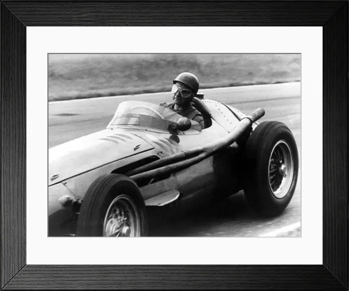 Framed Print : Juan Manuel Fangio - Racing driver in action Circa 1955