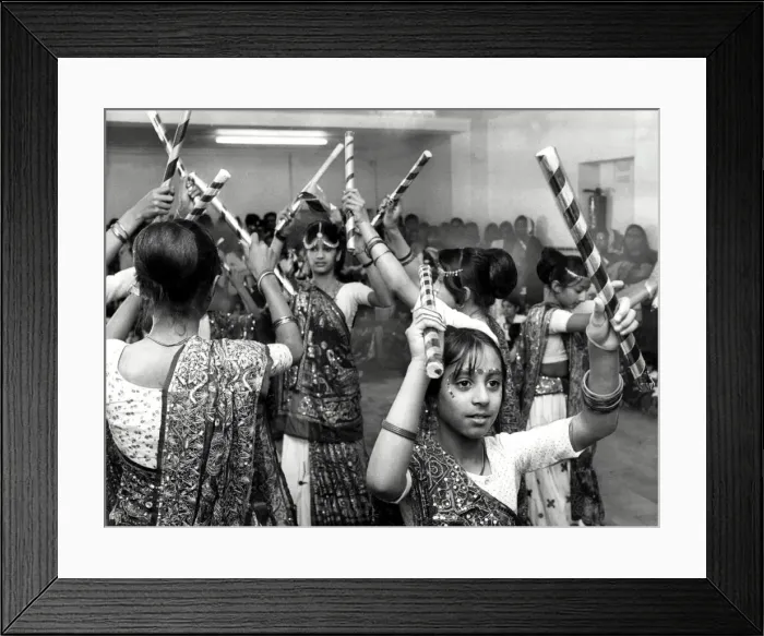 Framed Print : Dancers perform a traditional stick dance at the Hindu Temple, Merches Place, Grangetown Framed Print : Dancers perform a traditional stick dance at the Hindu Temple, Merches Place, Grangetown
