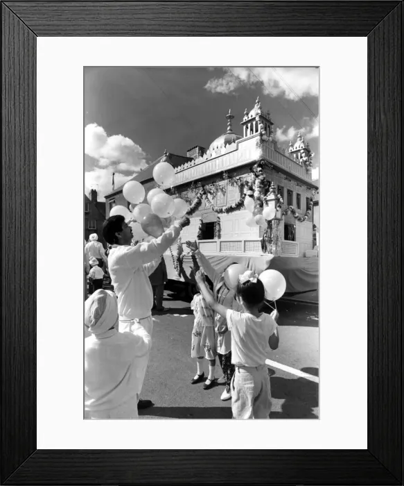 Framed Print : Cardiffs Riverside district was the backdrop for a huge celebratory procession Framed Print : Cardiffs Riverside district was the backdrop for a huge celebratory procession