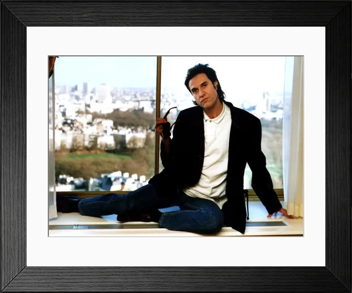Framed Print : Ray Davies The Kinks pop group singer sitting on office window ledge March 1990 Framed Print : Ray Davies The Kinks pop group singer sitting on office window ledge March 1990