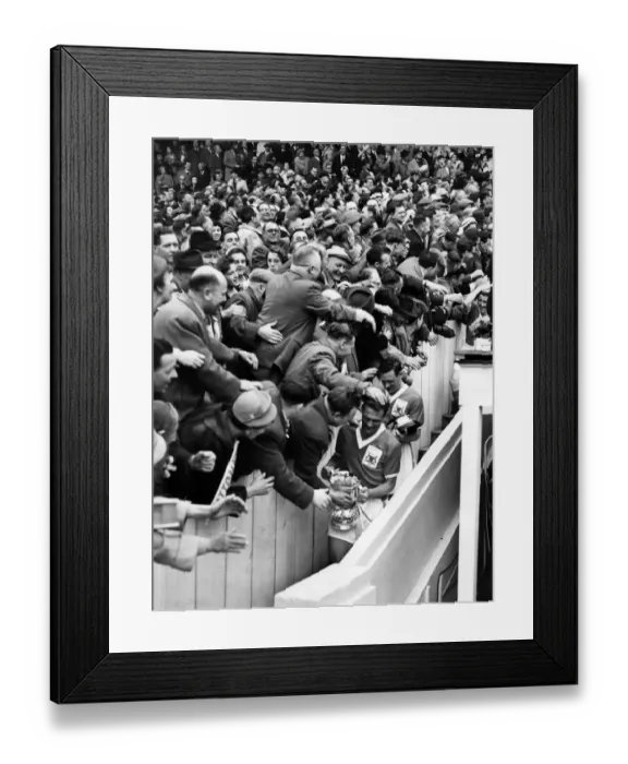 Framed Print : Jack Burkitt, Captain and left-half of Nottingham Forest, carrying cup down gangway Framed Print : Jack Burkitt, Captain and left-half of Nottingham Forest, carrying cup down gangway